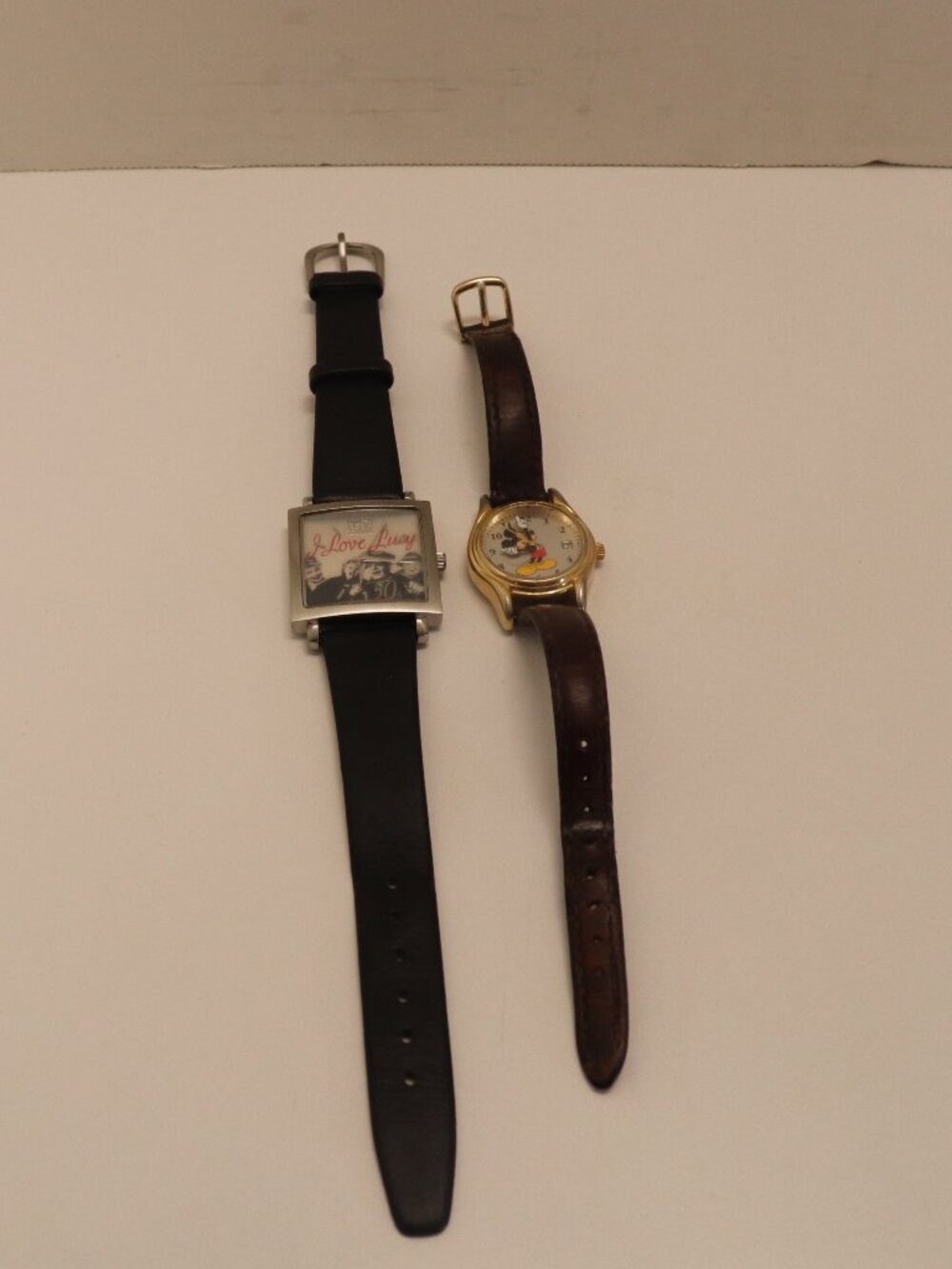 2 Watches 1 is a Disney Micky the Other is a I Love Lucy 50th Anniversary